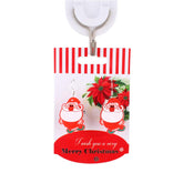 Christmas Flash Earrings – Festive Light-Up Holiday Jewelry featuring Santa design on a festive card.